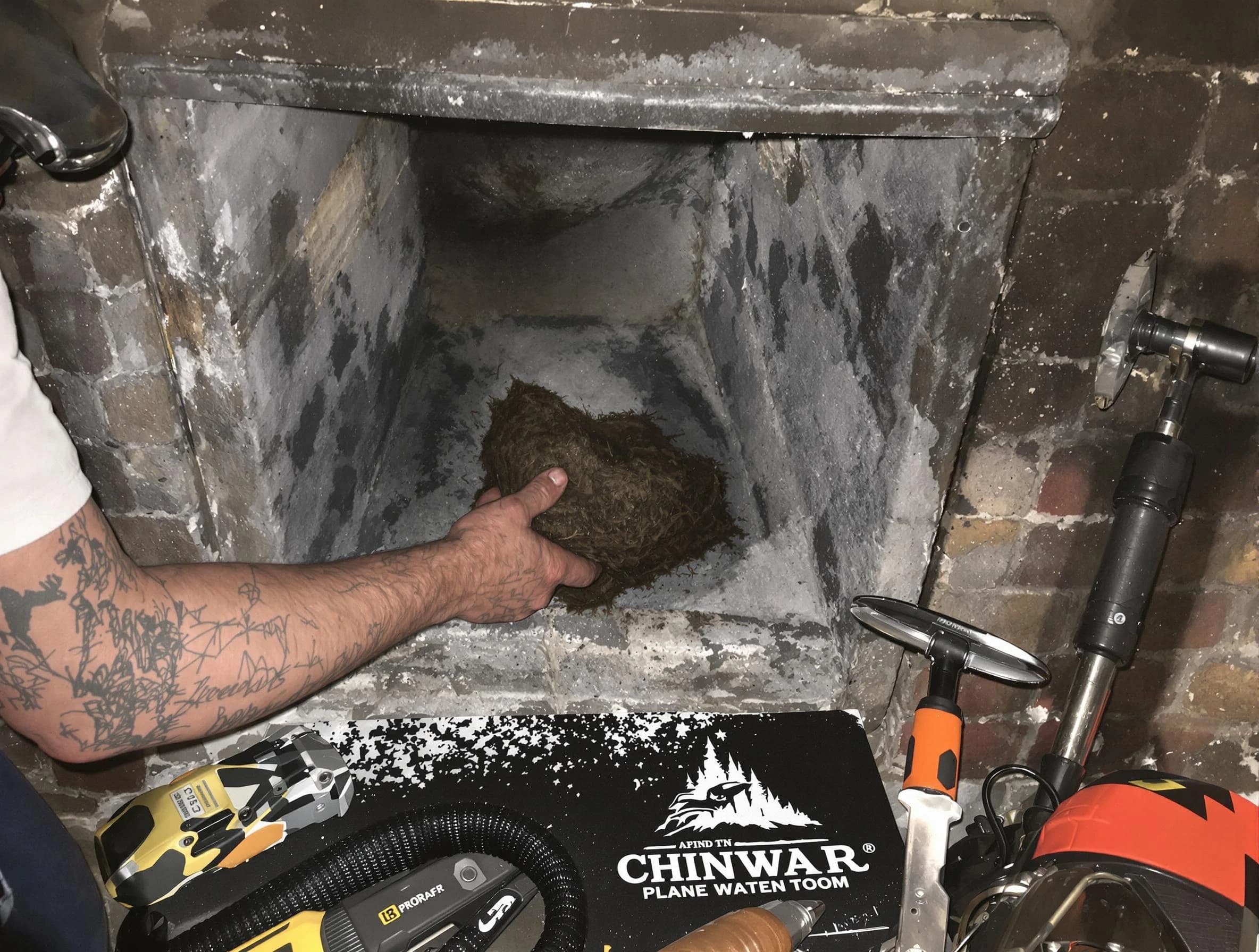 Watertown Town Chimney Sweep safely removing debris and screening chimney in Watertown Town, MA