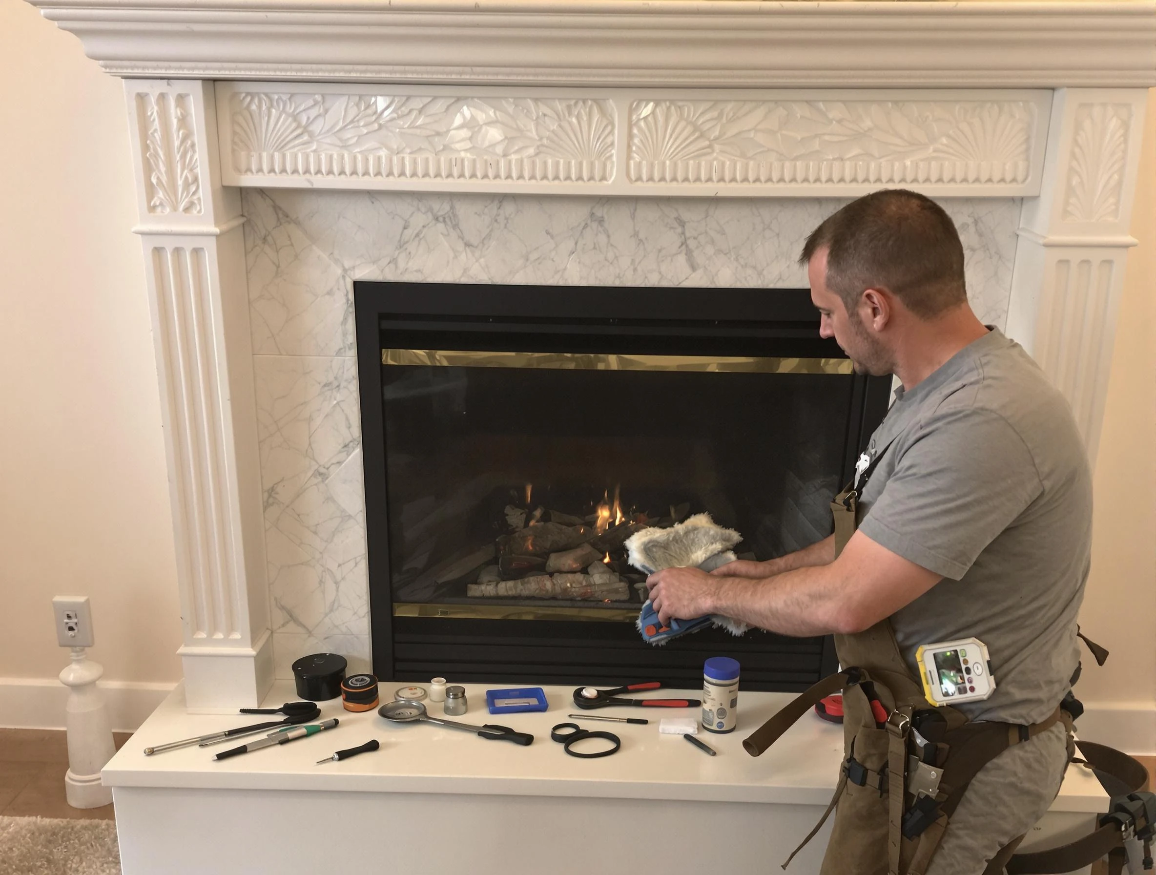 Watertown Town Chimney Sweep performing fireplace maintenance in Watertown Town, MA